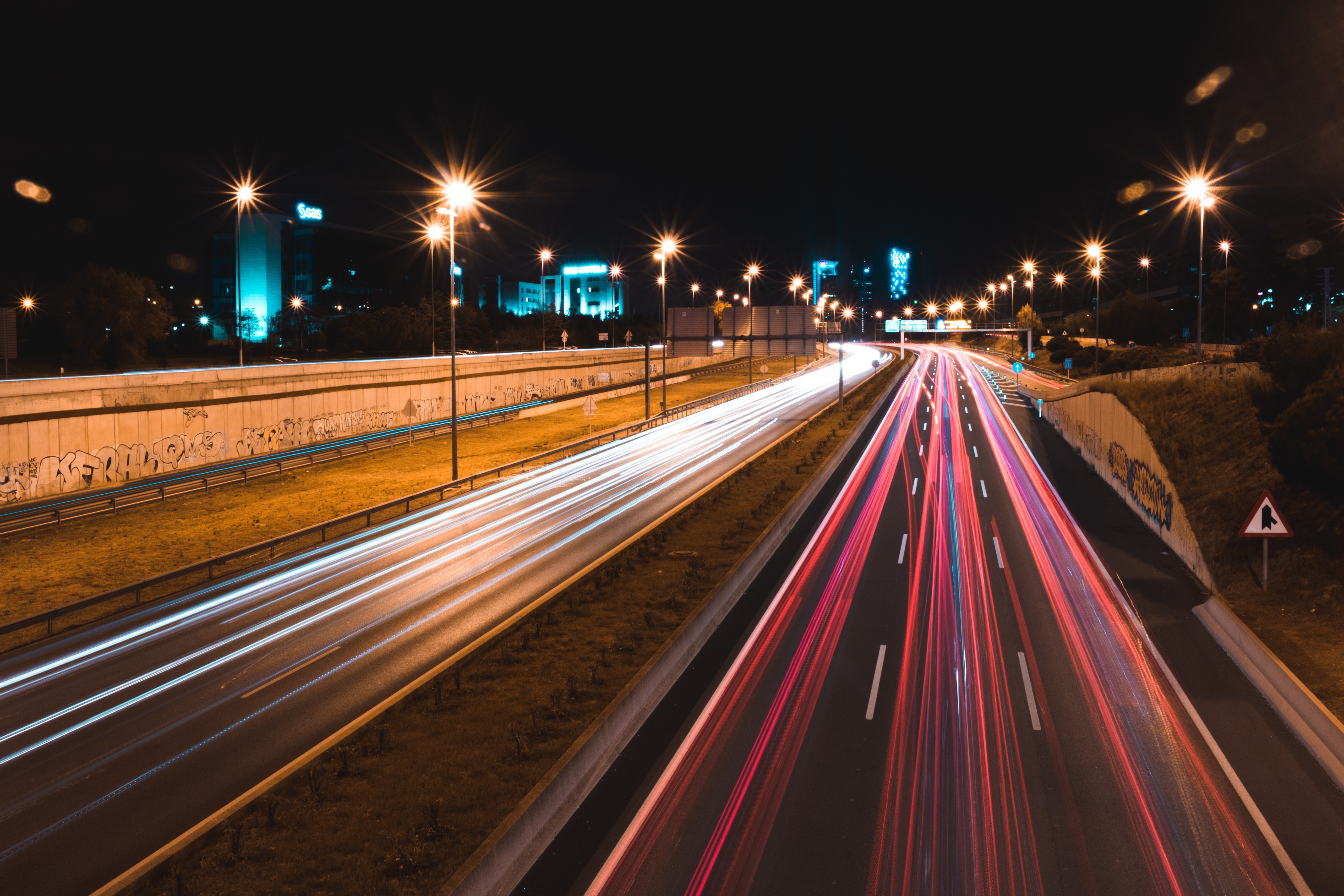 slow shutter effect on highway at night, Register for driving classes concept image